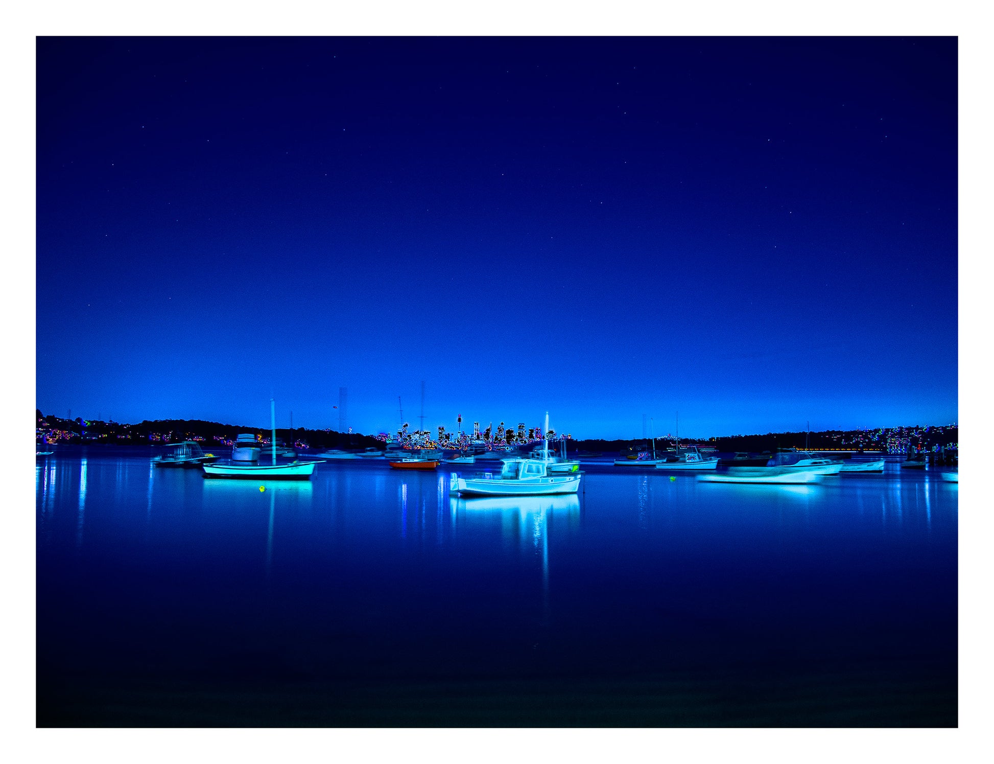 POPscape Sydney - Watsons Bay - Boats Night - 100970v2b3 - 104x81.5cm, Stylised night photograph of illuminated boats floating in Watsons Bay, Sydney. Deep blue tones and glowing highlights reflect on calm water under a star-speckled sky. Pop Art-style treatment with dreamlike vibrancy.