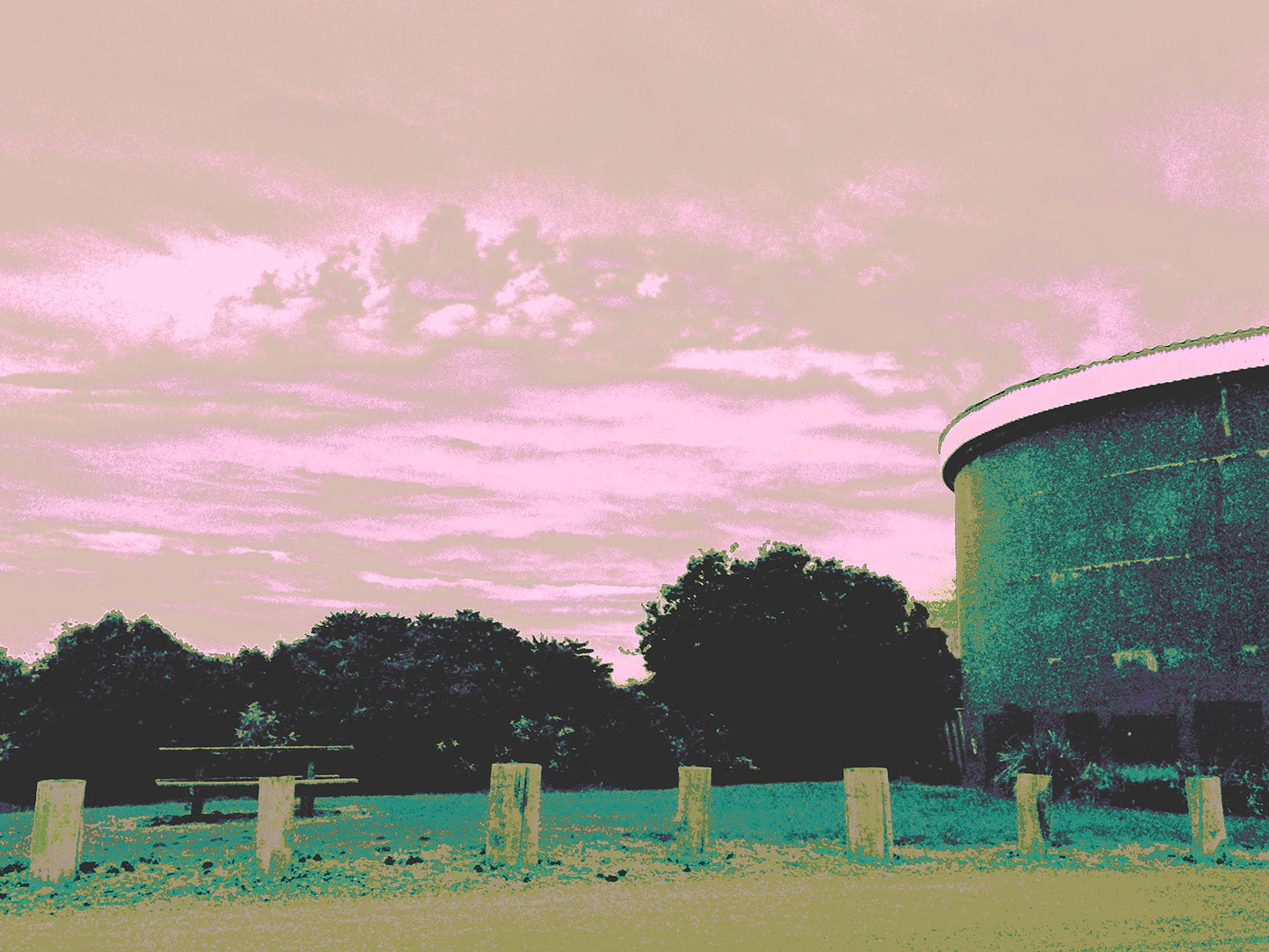 Vivid Country - Sawtell - Boambee Headland Lookout - 2993v1054 - 90x67.5cm, Stylised fine art image of Boambee Headland Lookout, featuring a curved concrete water tower, picnic table, and soft pink and green sky with trees and bollards in the foreground.