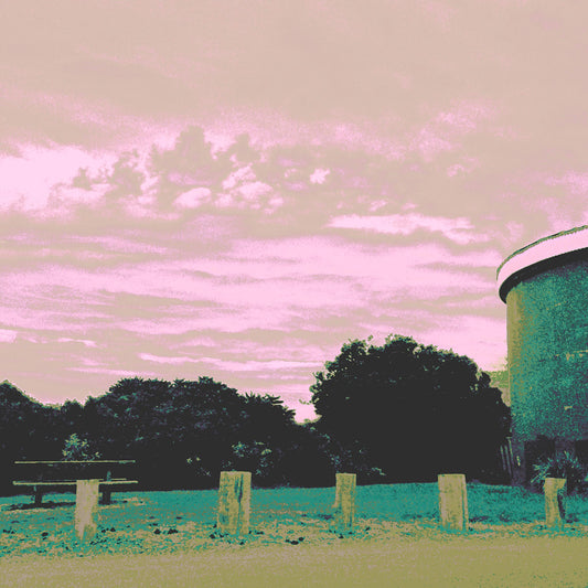 Vivid Country - Sawtell - Boambee Headland Lookout - 2993v1054 - Close Detail View, Stylised fine art image of Boambee Headland Lookout, featuring a curved concrete water tower, picnic table, and soft pink and green sky with trees and bollards in the foreground.