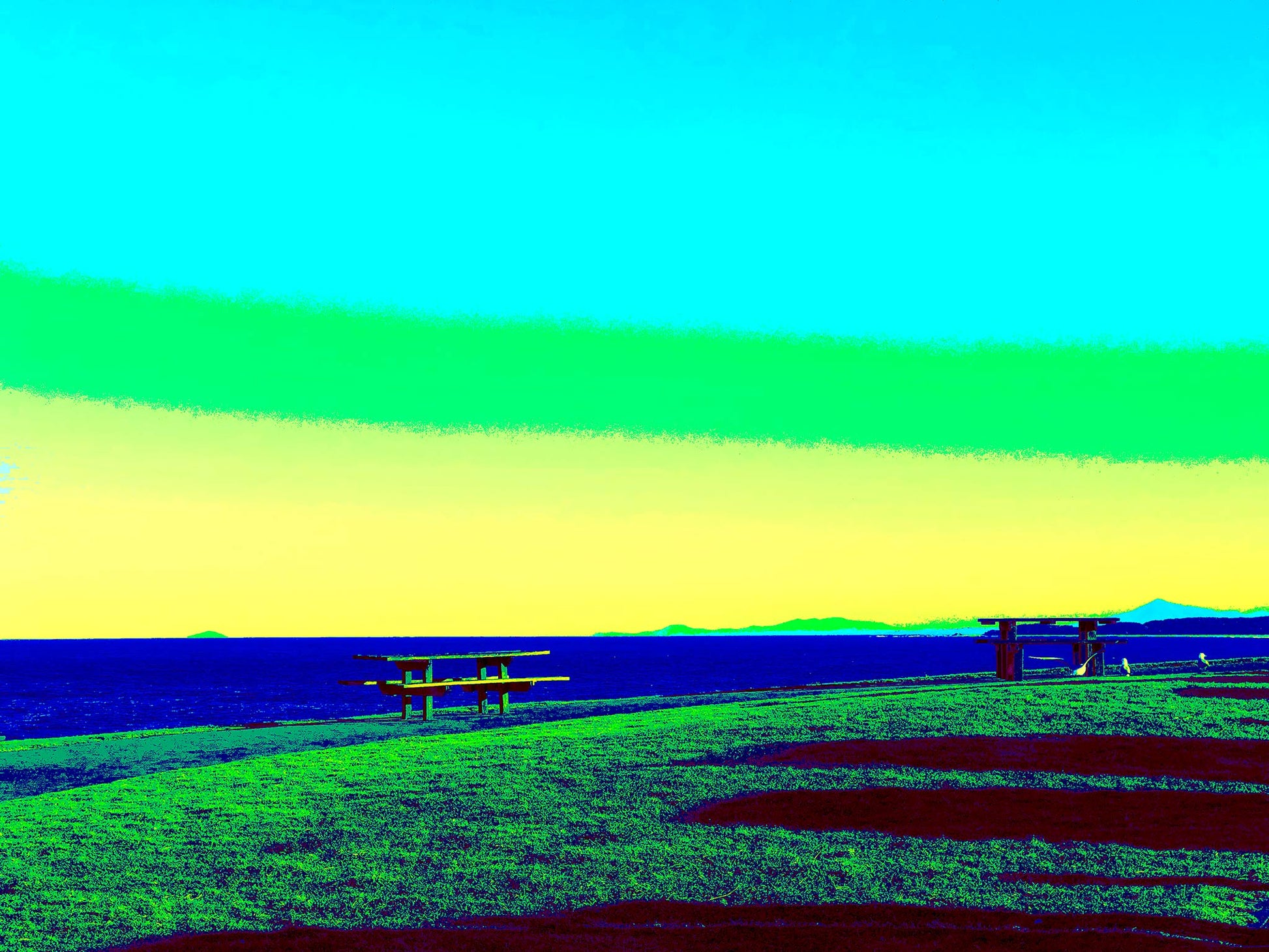 Vivid Country - Sawtell - Bonville Headland Lookout - 1704v25 - 90x67.5cm, Fine art pop-style landscape featuring picnic tables on grassy cliffs at Bonville Headland Lookout, Sawtell, with a vivid sky in gradients of aqua, green, and yellow above a deep blue ocean.