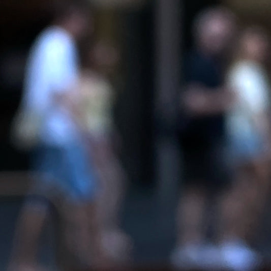 Urban Commute - Series No.1: 0981v1 - Close Detail View, a soft focus photograph of five blurred commuters passing through a cool toned city street. Their outlines blend and separate in motion, evoking fleeting connection and urban rhythm. Limited edition fine art print by Raymond Mather.
