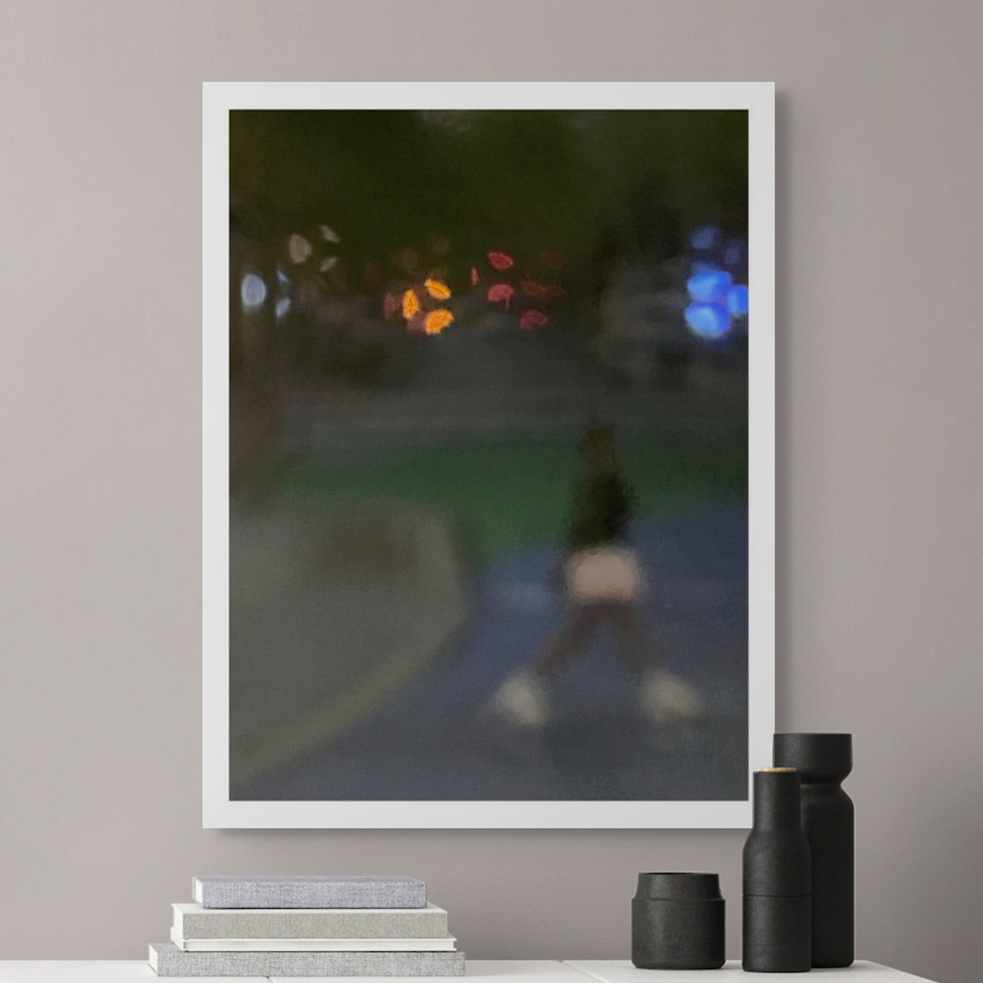 Urban Commute - Series No.1: 1206v1 - Room View, a soft focus evening image of a single blurred commuter walking across a dim city path, with scattered lights in red, orange, and blue glowing in the distance. A moody, atmospheric urban scene in motion. Limited edition fine art print by Raymond Mather.