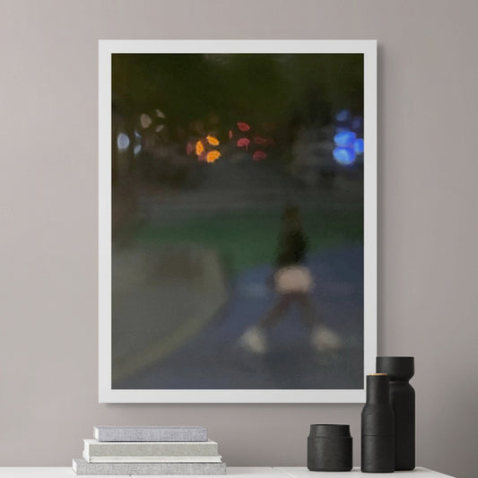 Urban Commute - Series No.1: 1206v1 - Room View, a soft focus evening image of a single blurred commuter walking across a dim city path, with scattered lights in red, orange, and blue glowing in the distance. A moody, atmospheric urban scene in motion. Limited edition fine art print by Raymond Mather.