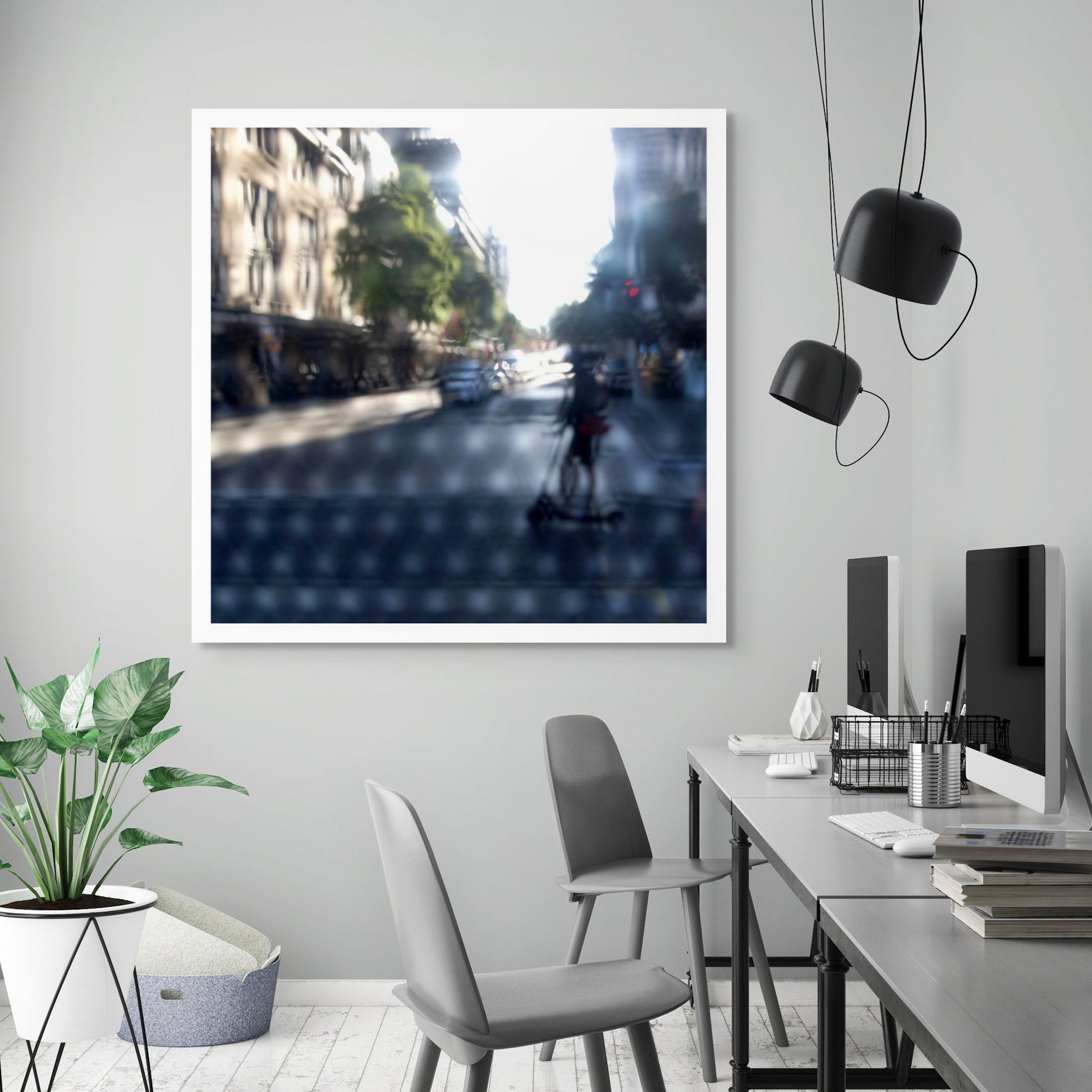 Urban Commute - Series No.2: 9230v1a - Room View, fine art photograph by Raymond Mather featuring a silhouetted scooter rider crossing a sunlit city street. Seen through a patterned screen, the image blends light, blur, and architectural rhythm into a poetic urban abstraction.