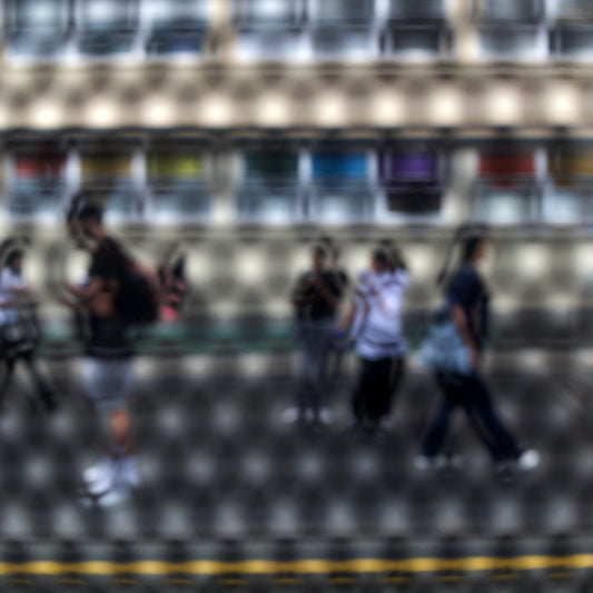 Urban Commute - Series No.2: 9558(1)v1 - Close Detail View, fine art photograph by Raymond Mather showing a group of pedestrians walking past a multicoloured glass façade, viewed through a circular screen. The image blurs motion, structure, and rhythm into a poetic urban abstraction.