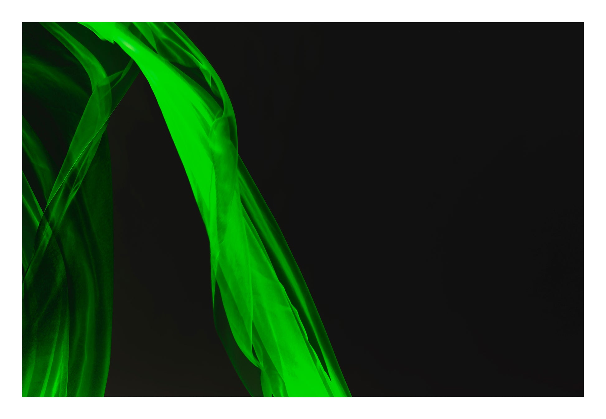 Xtra POP Set - Fabric Flow - Green - 1936900122v29 - 104x74cm, Abstract green sheer fabric in motion on black background. Minimalist, glowing form. Limited edition fine art print.