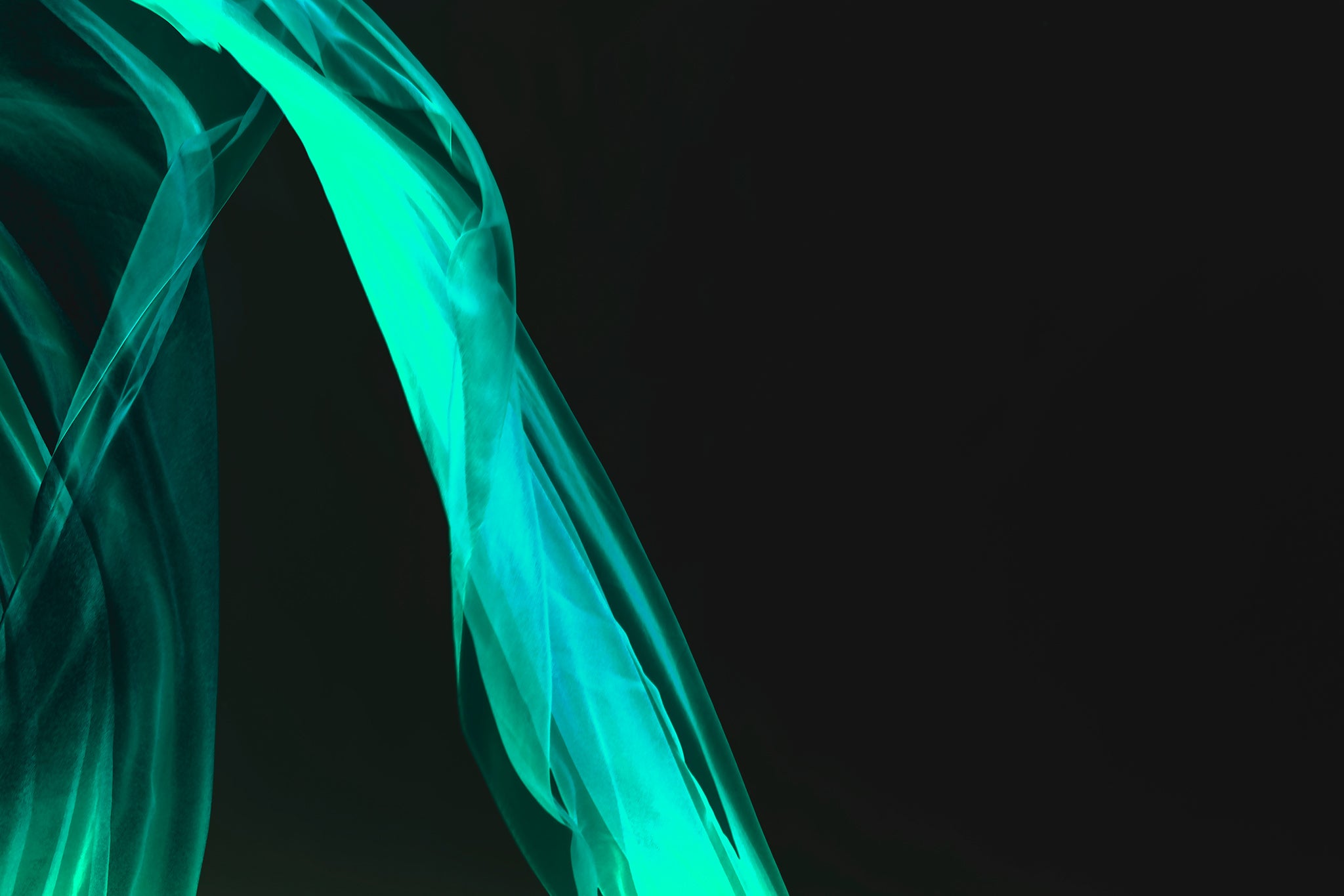 Xtra POP Set - Fabric Flow - Teal - 1936900122v30 - 90x60cm, Flowing teal fabric curves over a black background. Abstract, airy composition in this limited edition fine art print.